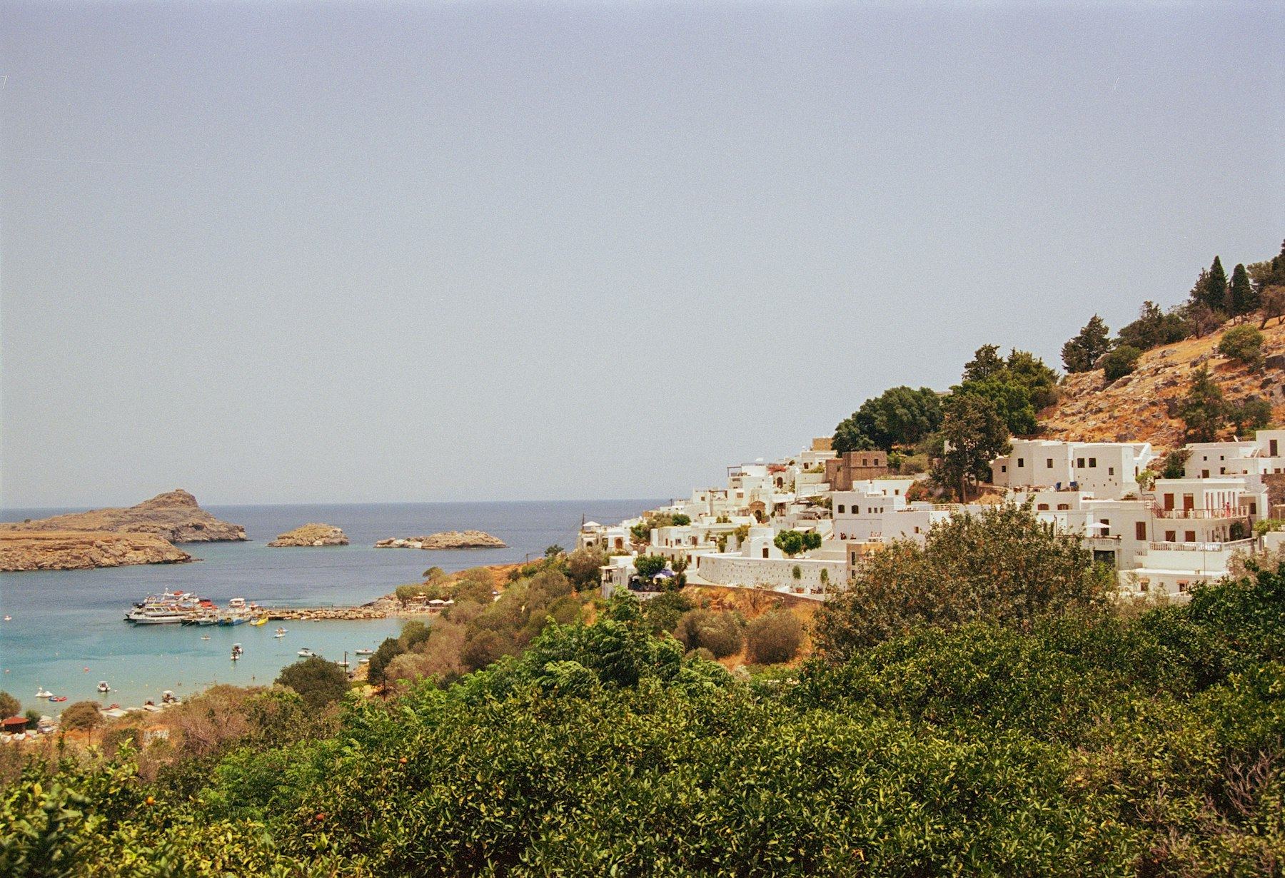 Lindos village and the Acropolis of Lindos above the bay